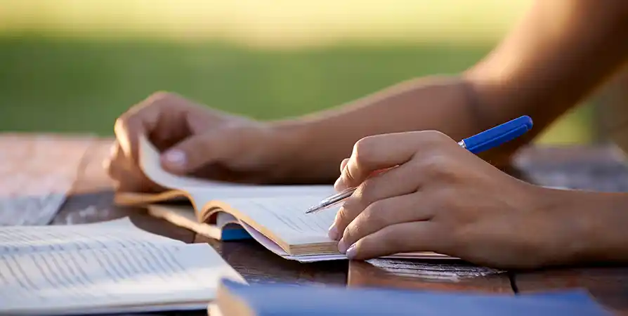 Students studying with a laptop